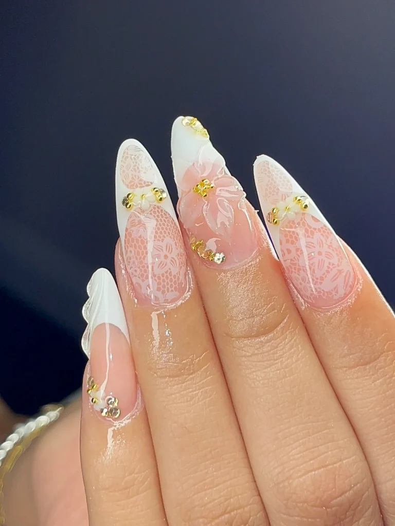 white lace floral bridal long almond nails with gold bead and rhinestone accents