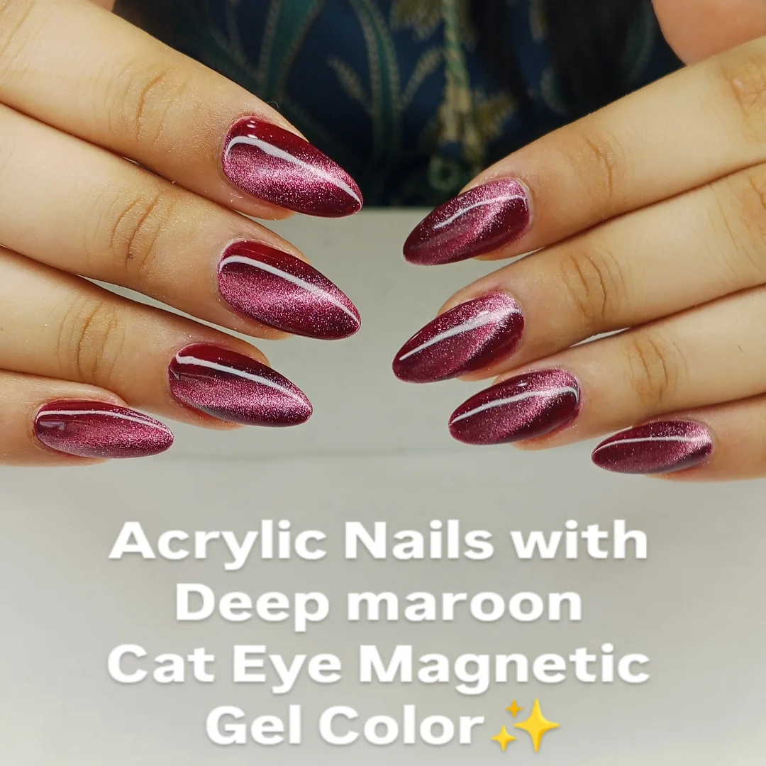 Deep maroon cat-eye chrome almond acrylic nails