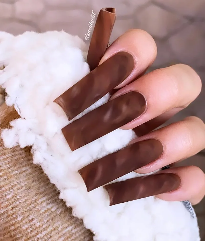 Long matte brown coffin nails