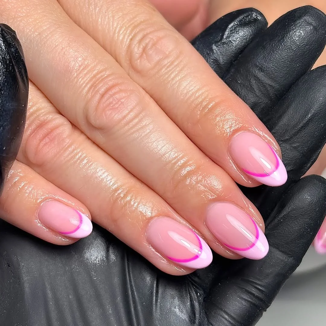 Double pink French tip nails with fine line detail