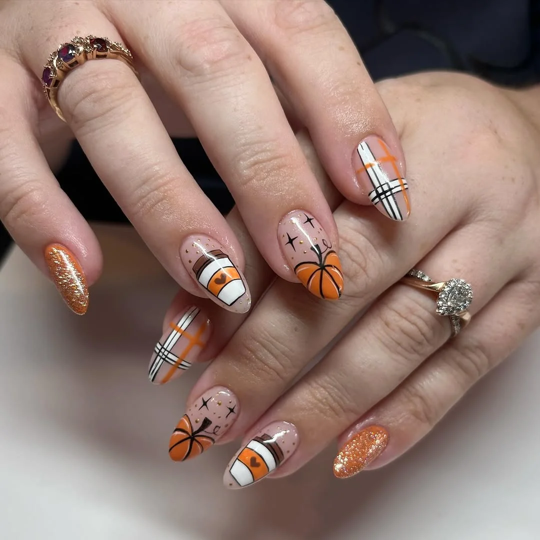 Fall almond nails with pumpkin, plaid and coffee cup art