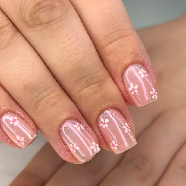 Pink chrome short nails with small daisy art