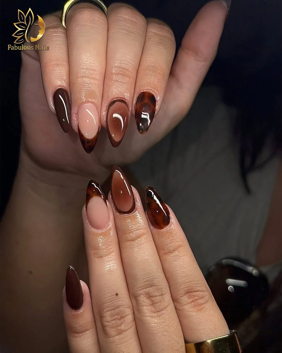 Brown ombré almond nails with tortoiseshell accent tips