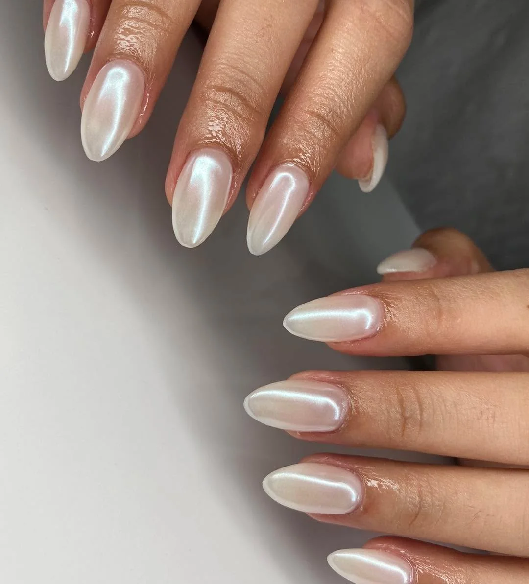 Glazed pearl white chrome almond nails