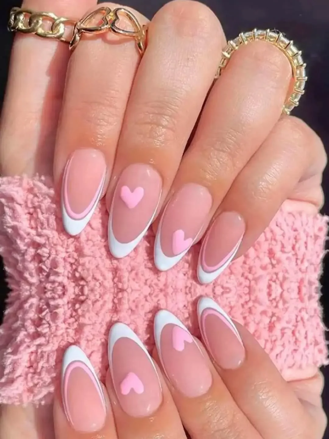Pink French nails with double white lines and pink hearts