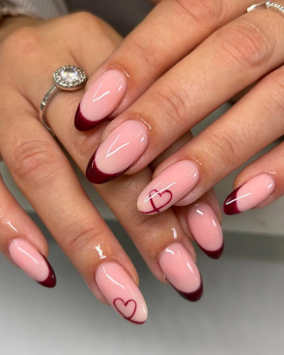 Burgundy Heart French nail design idea