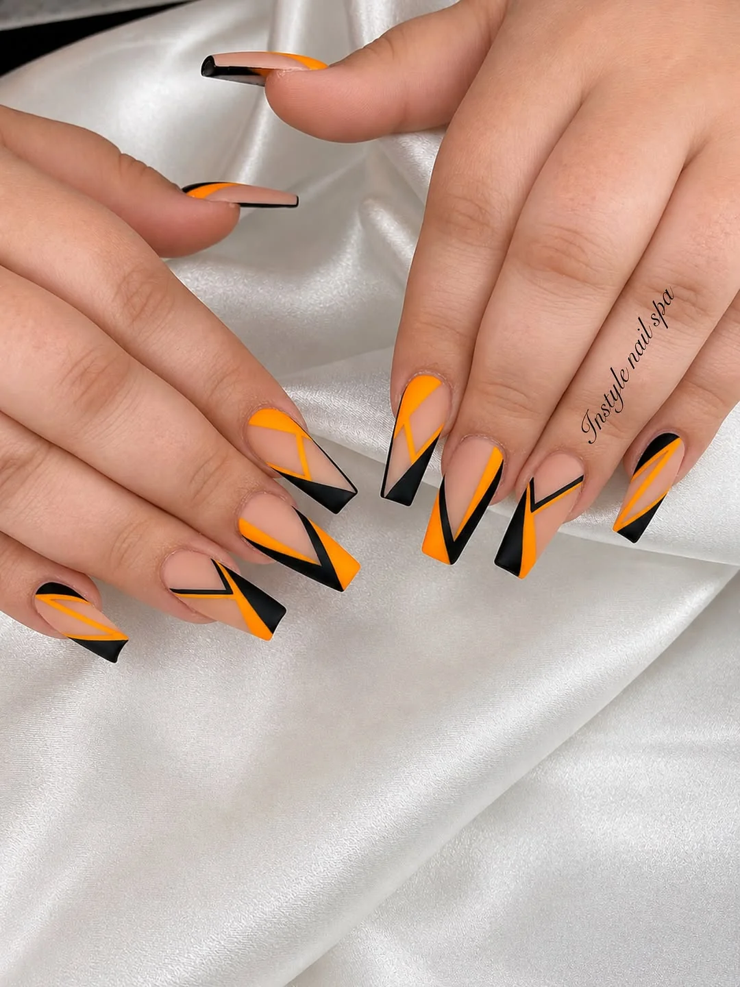 Orange Black Stiletto nail design: orange black stiletto french
