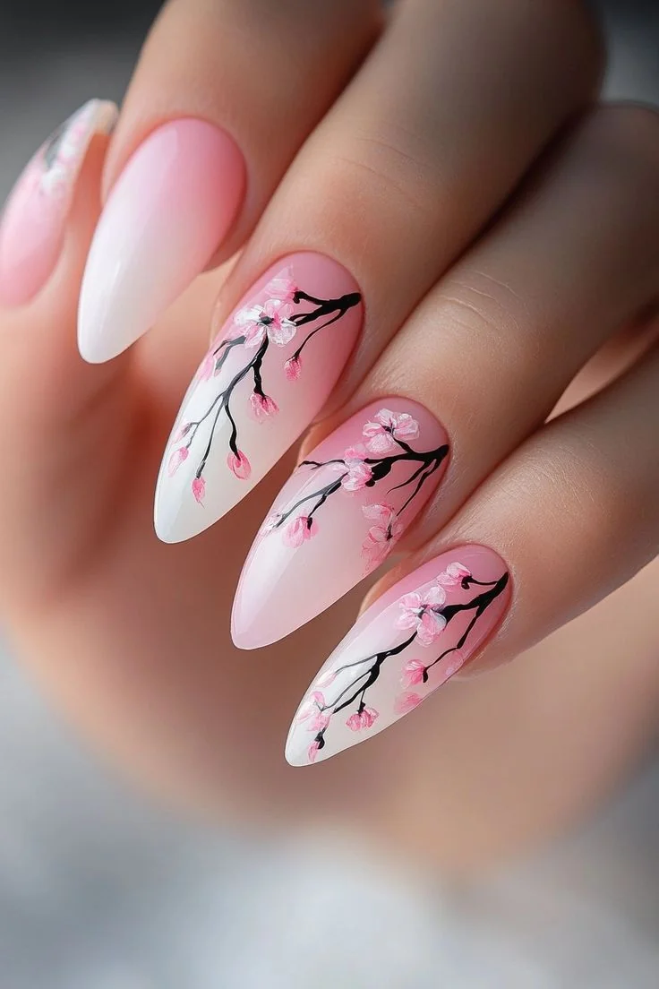 Pink ombré almond nails with cherry blossom branch art