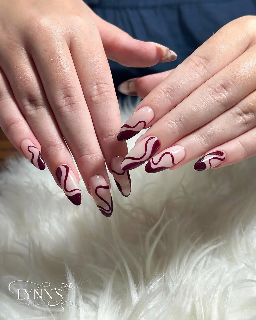 Burgundy Wave nail design idea