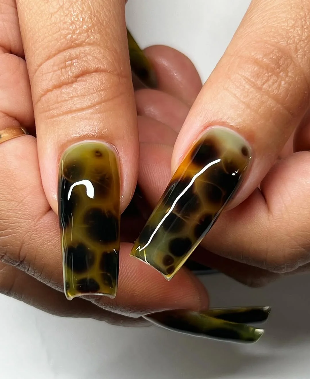 Long square nails in amber jelly tortoiseshell