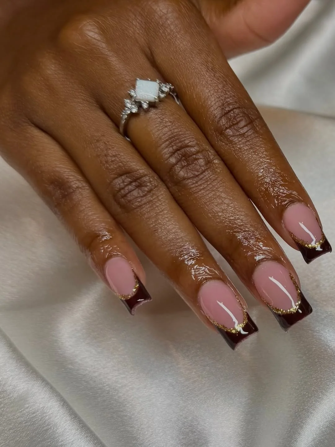 Glossy Brown French Nail Design Glossy Brown French nail design idea