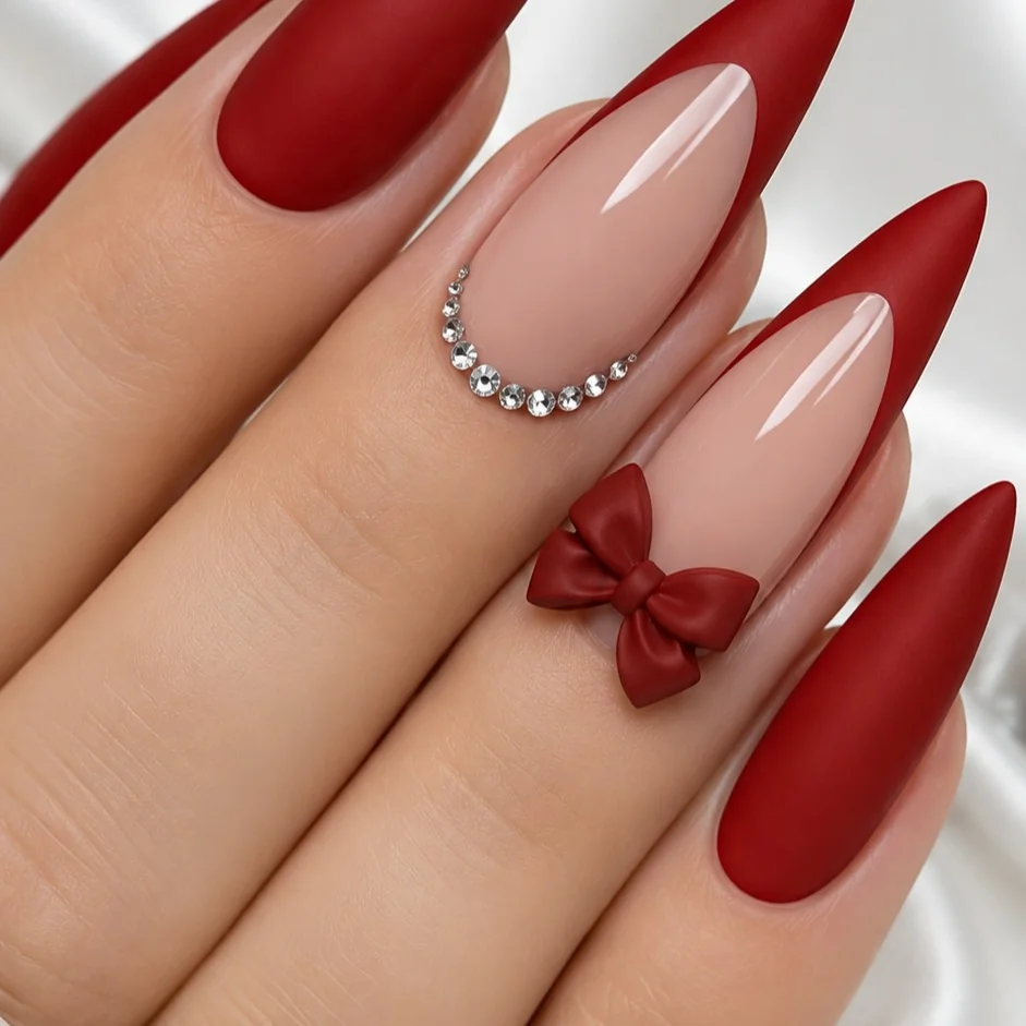 Cherry Red Almond nail design: red matte almond with bow