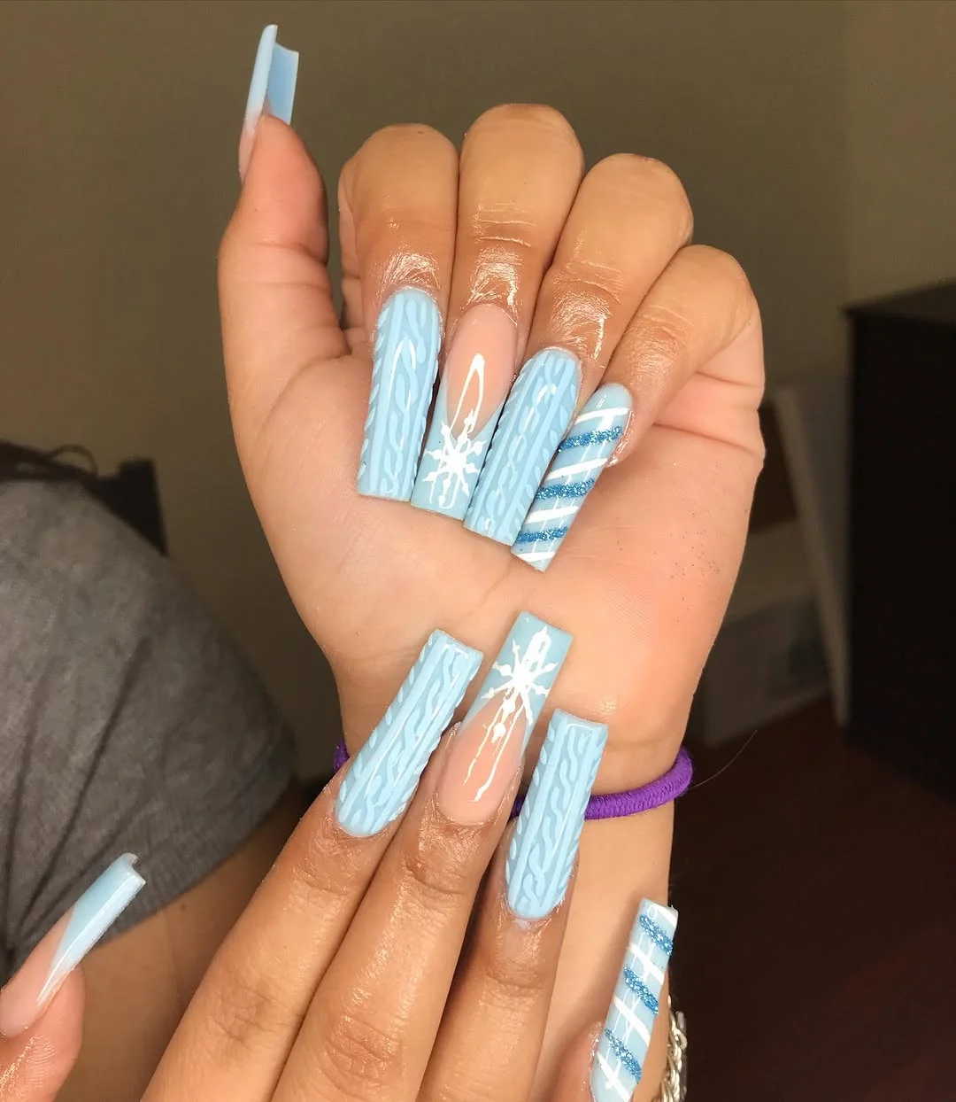 Baby blue long coffin nails with knit texture and snowflake art