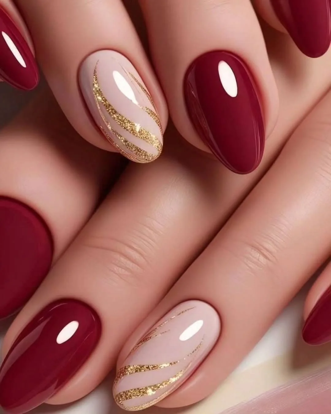 Burgundy Gold Swirl nail design idea