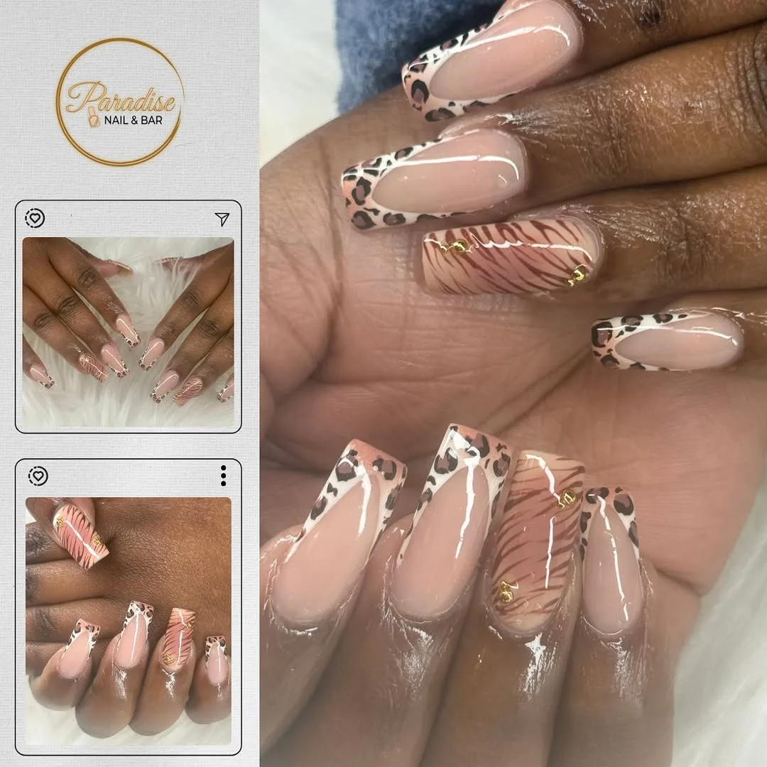 Nude almond nails with tiny gold chains and studs