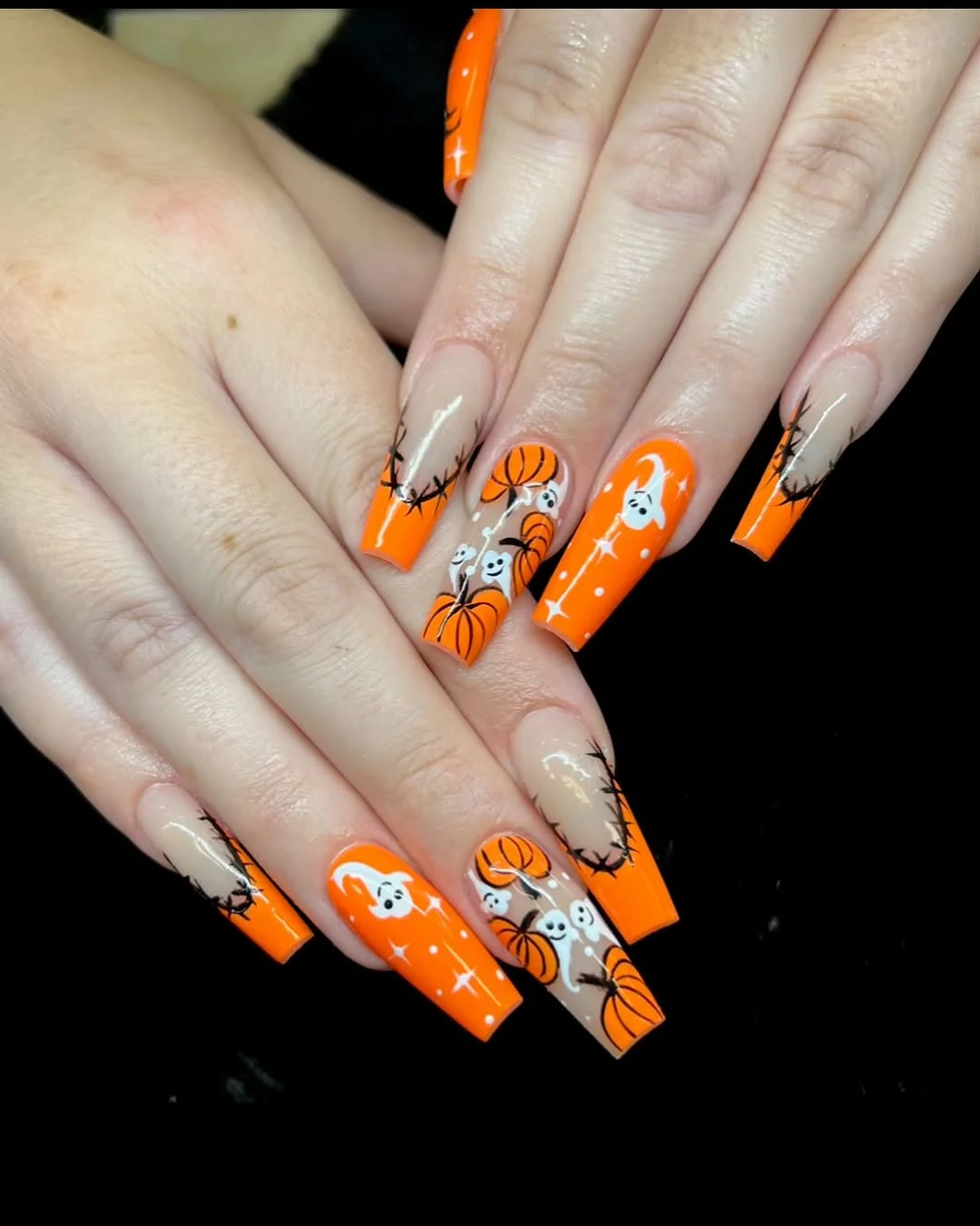 Orange Glitter Stiletto nail design: orange glitter coffin w ghost/art