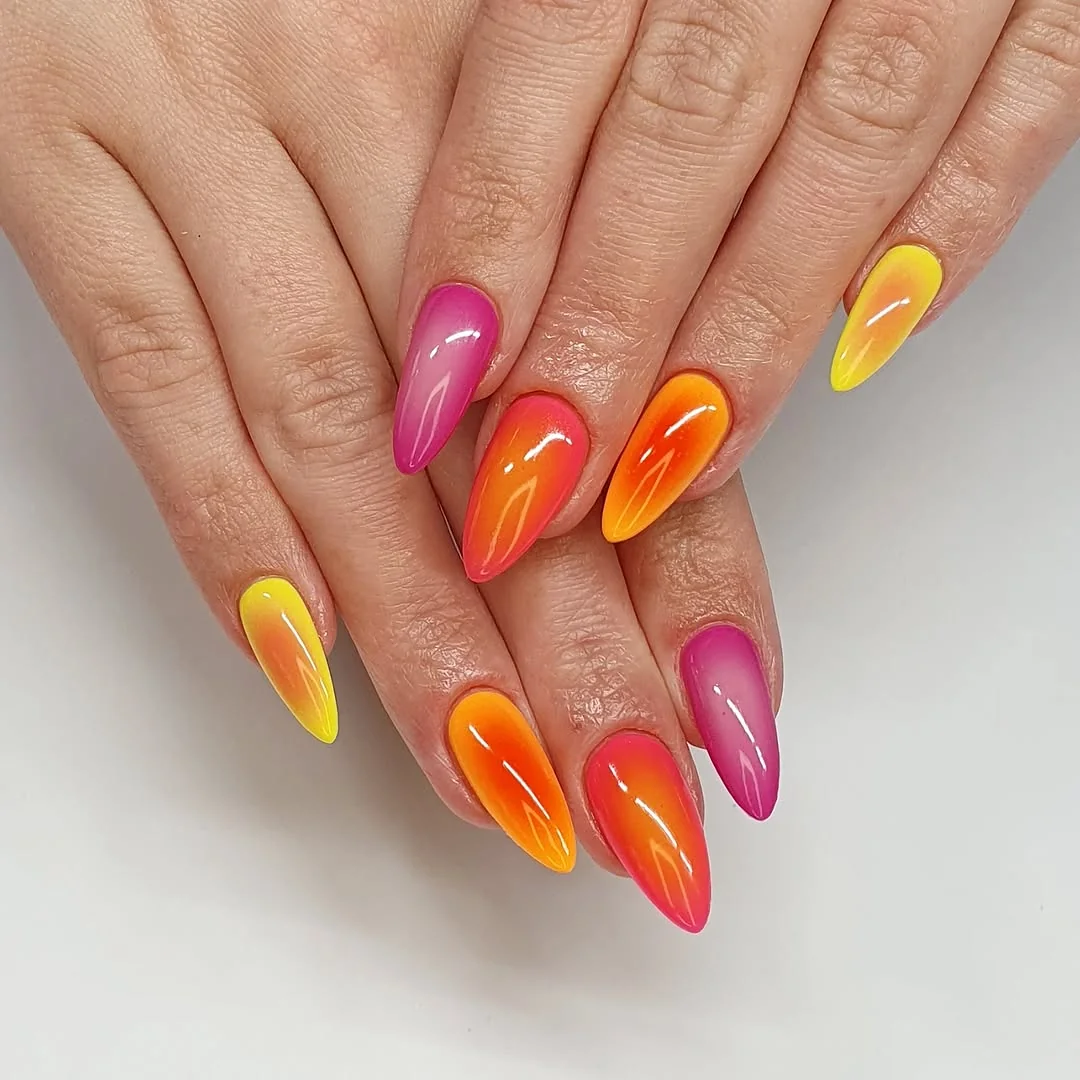 Pink, orange and yellow aura sunset gradient almond nails