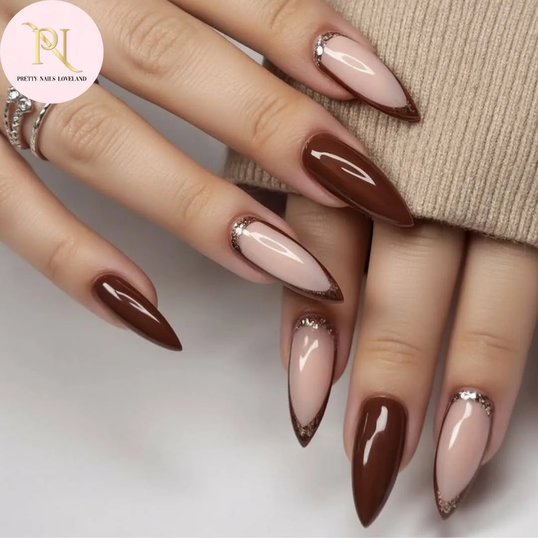 Brown and nude almond nails with a glossy finish