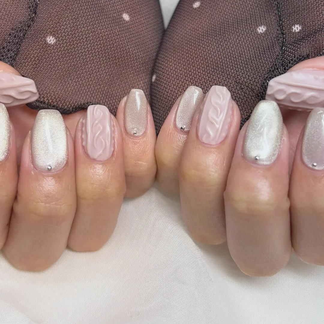 Pearl white and nude coffin nails with cable-knit texture and rhinestones