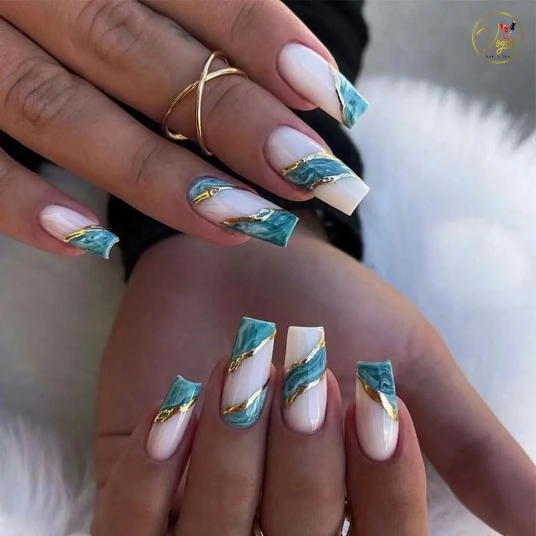 Teal and white marble nails with gold foil lines on square tips