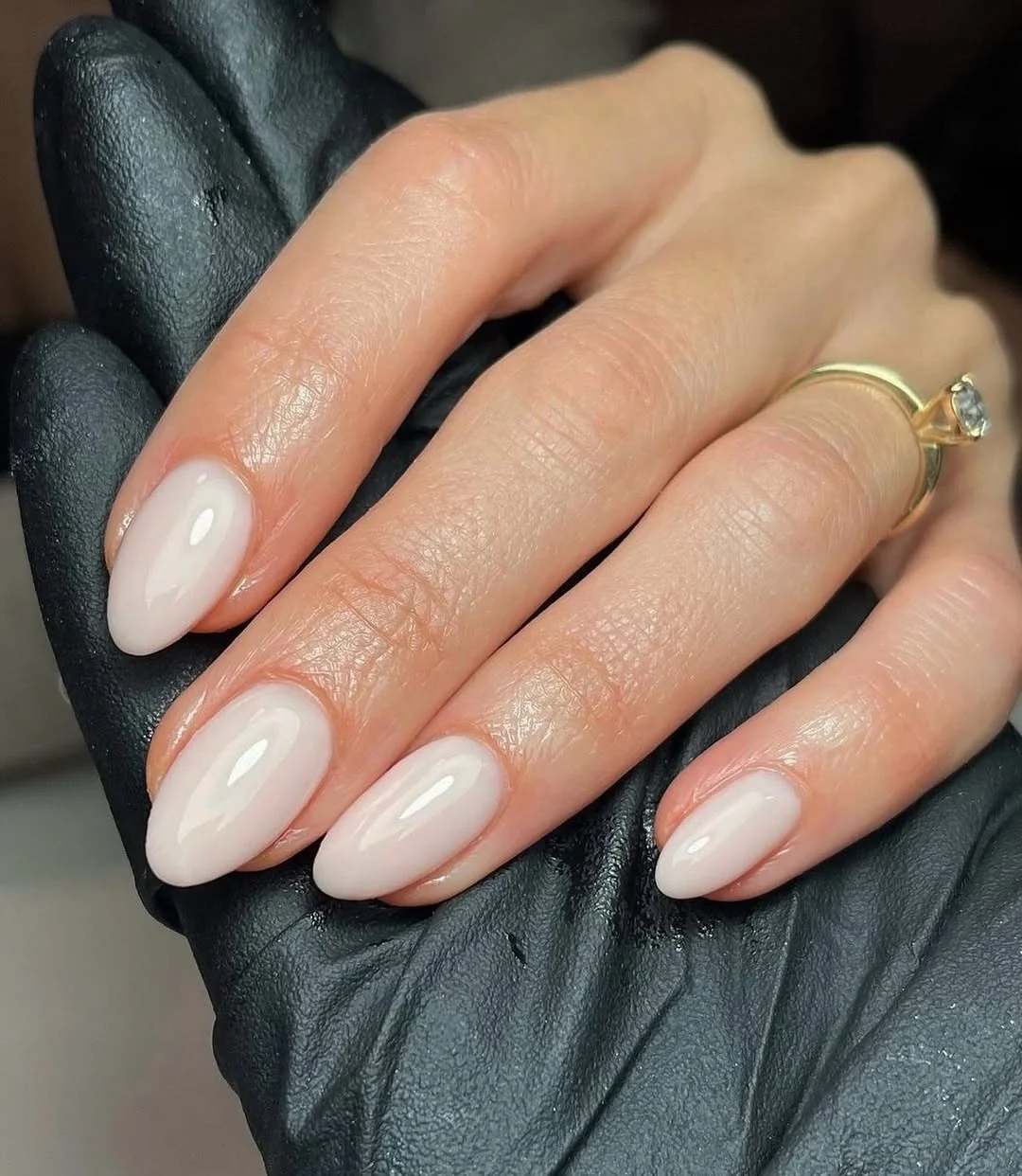 Glossy milky nude almond nails