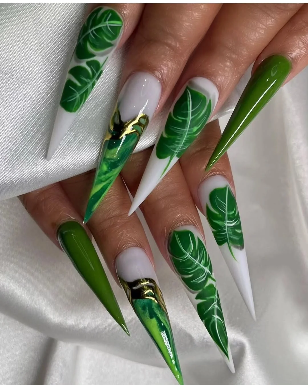 Green and white stiletto nails with tropical palm leaf art