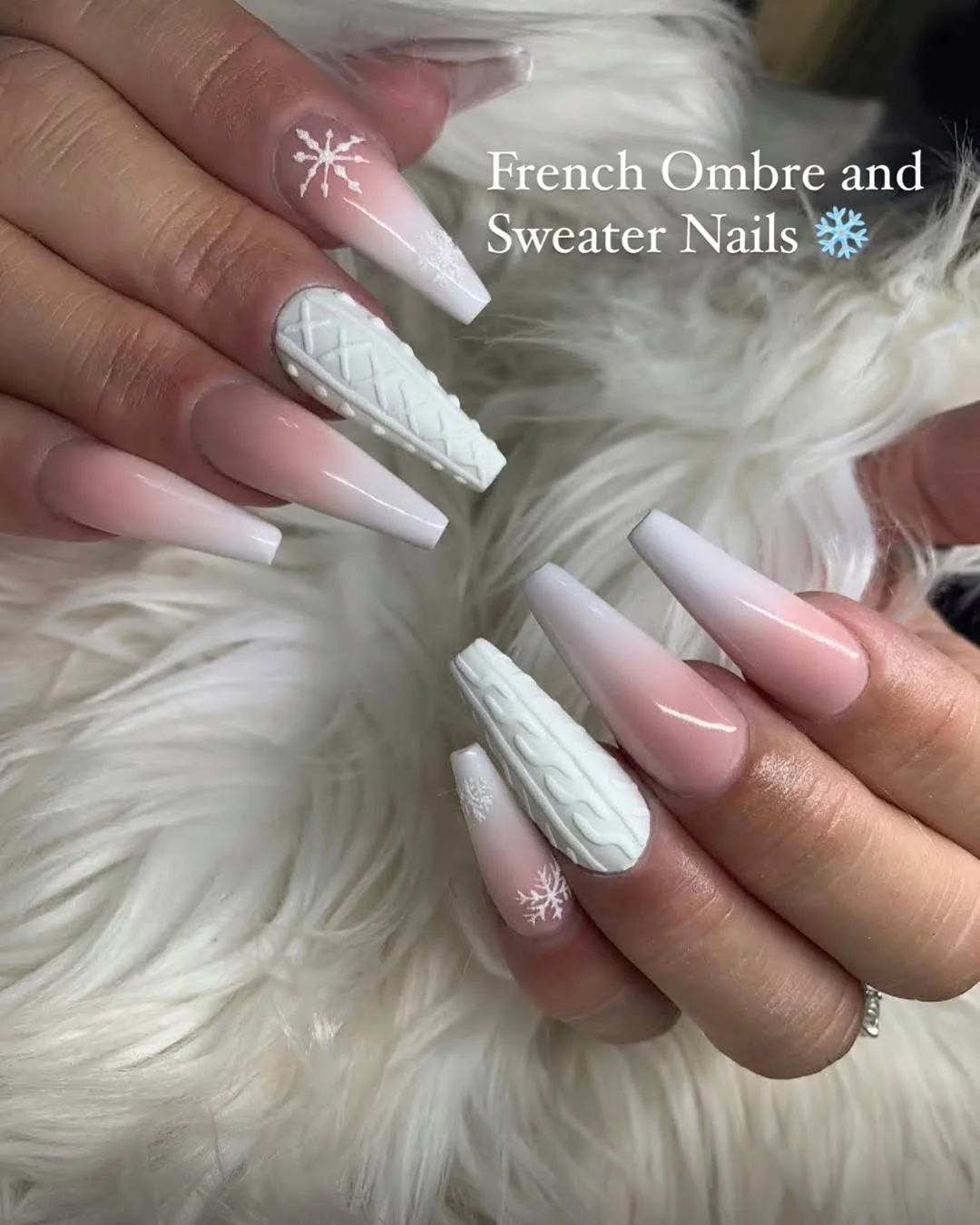 Pink to white ombré coffin French nails with white cable-knit sweater accents