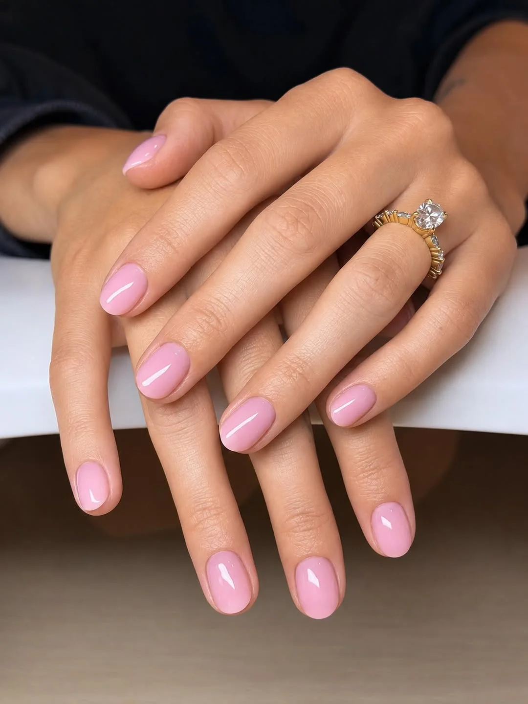 Short natural pink nails with a soft glossy finish