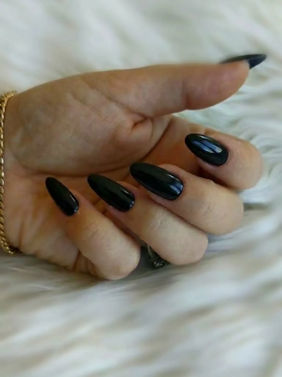 Glossy Black Almond nail design idea