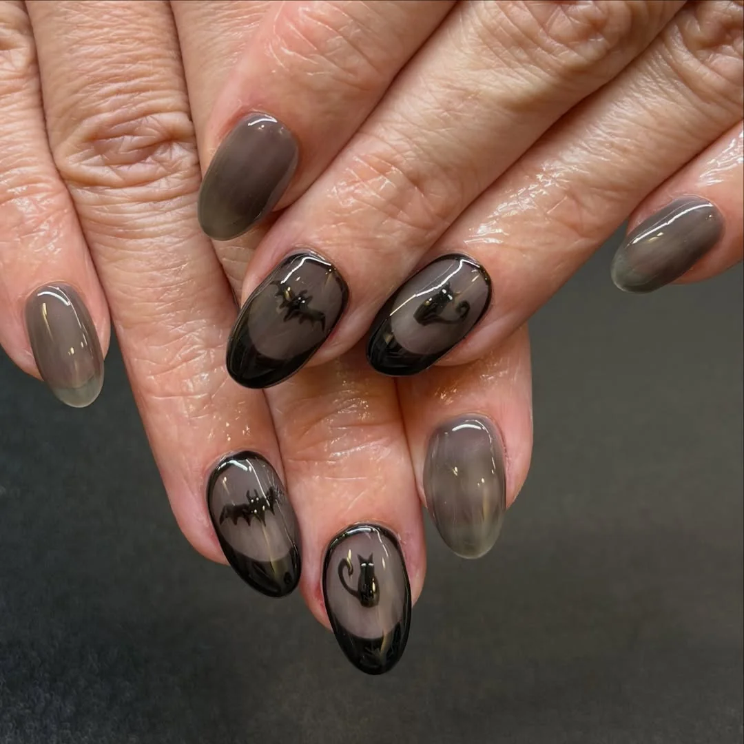 Smoky Bat Almond nail design idea