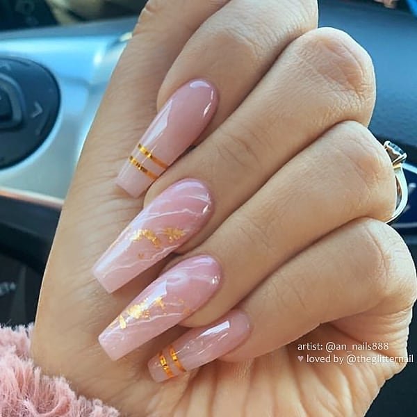Pink and white marble coffin nails with gold stripes