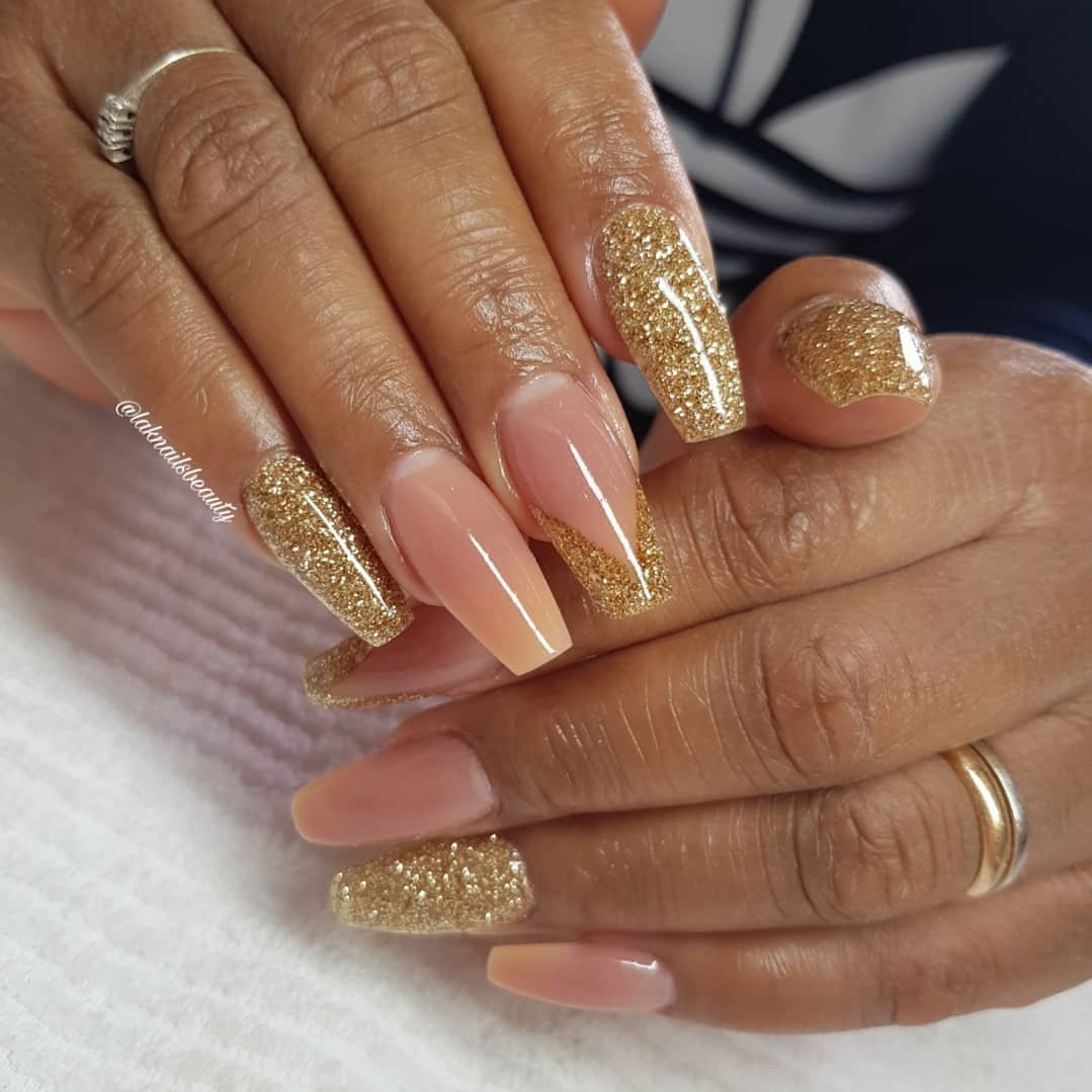 Nude coffin nails with gold glitter accent nails
