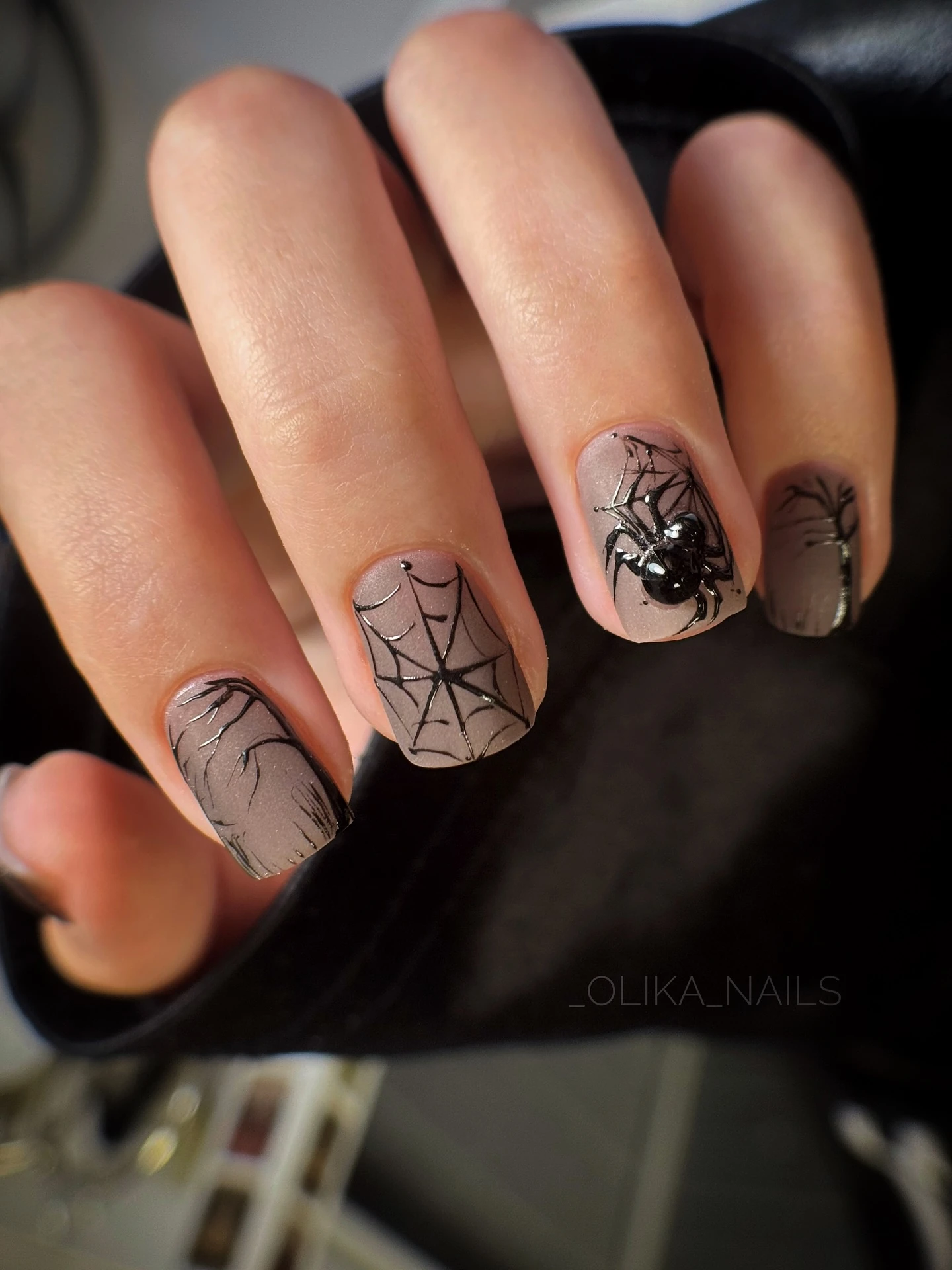 Short black and silver Halloween nails